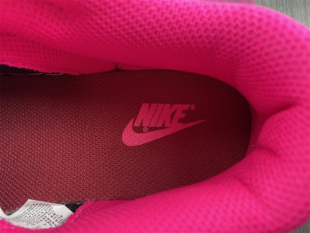 from Nike Spruces Up Its Dunk Low Team Red/Pink DQ9324-600